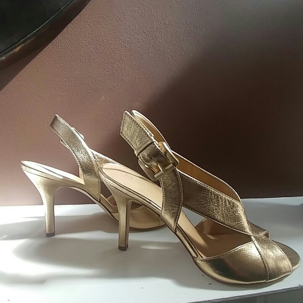 The cutest gold sling back sandal heels